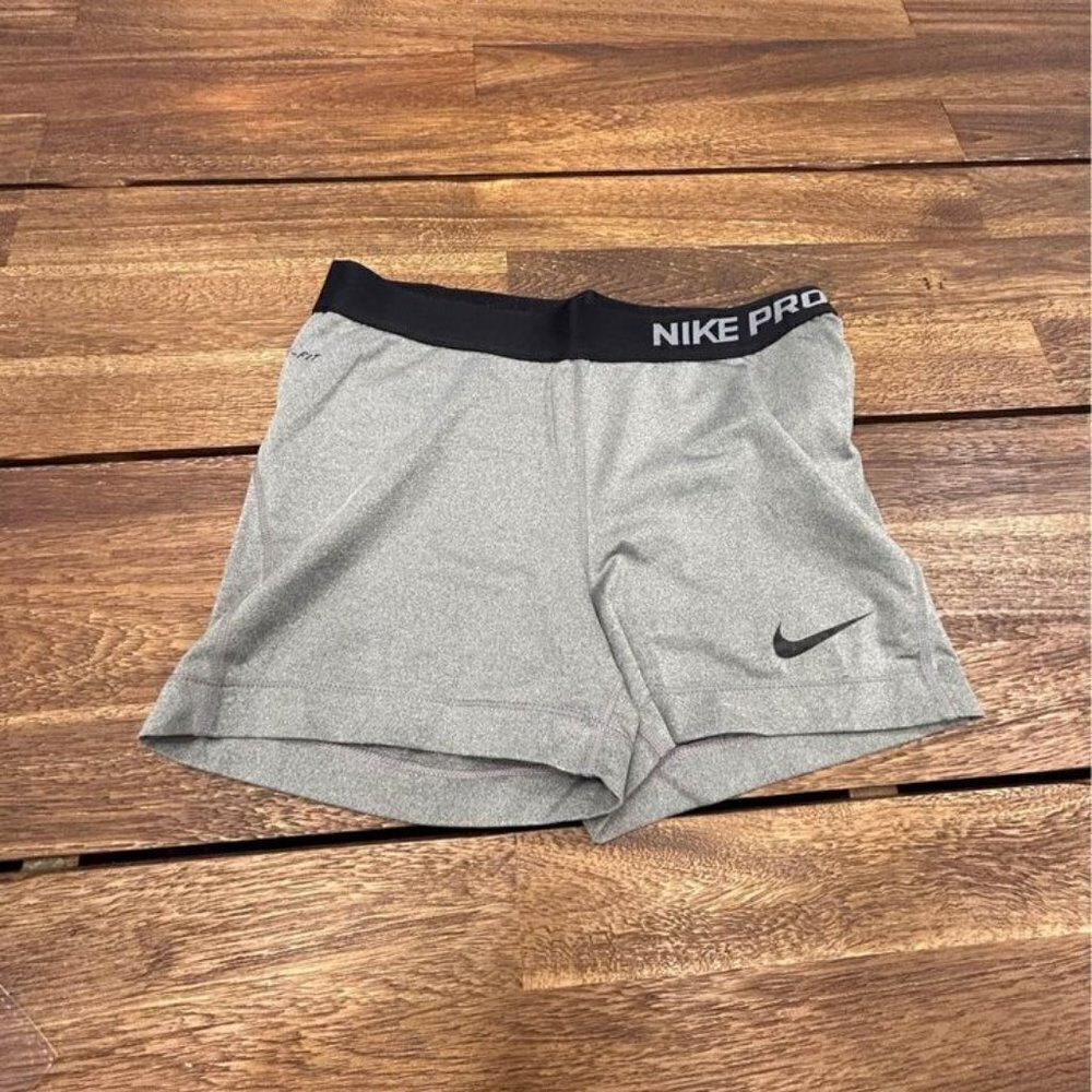Woman’s NIKE PRO running shorts. Gray/black size medium. Excellent condition.